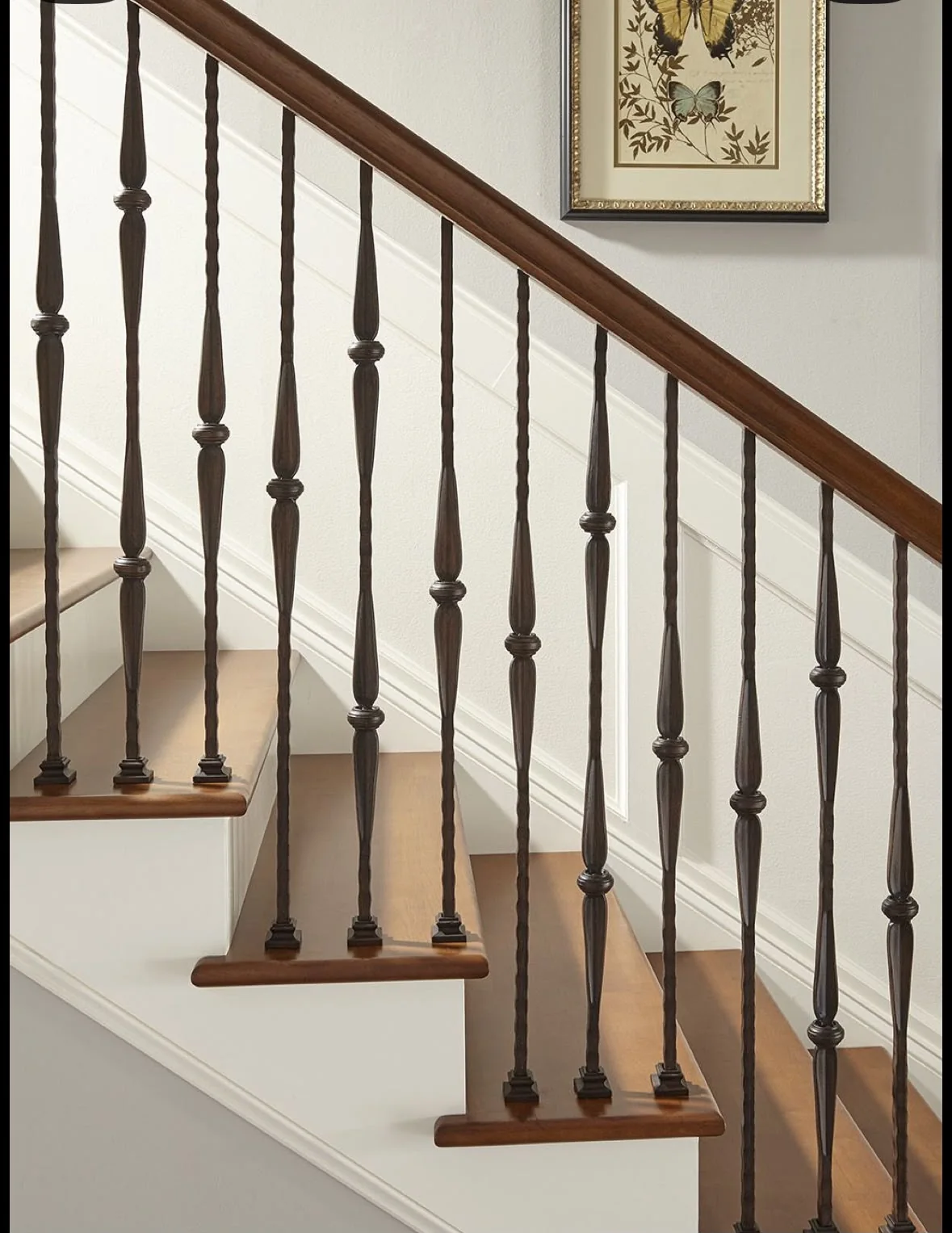 Finished stair railing with timber handrail.